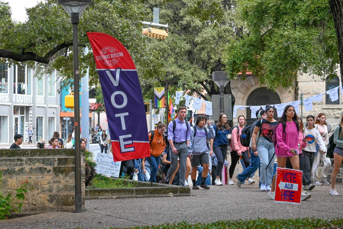 A group of students walk across Guadalupe near the Texas Union on Election Day, Nov. 5, 2024. 