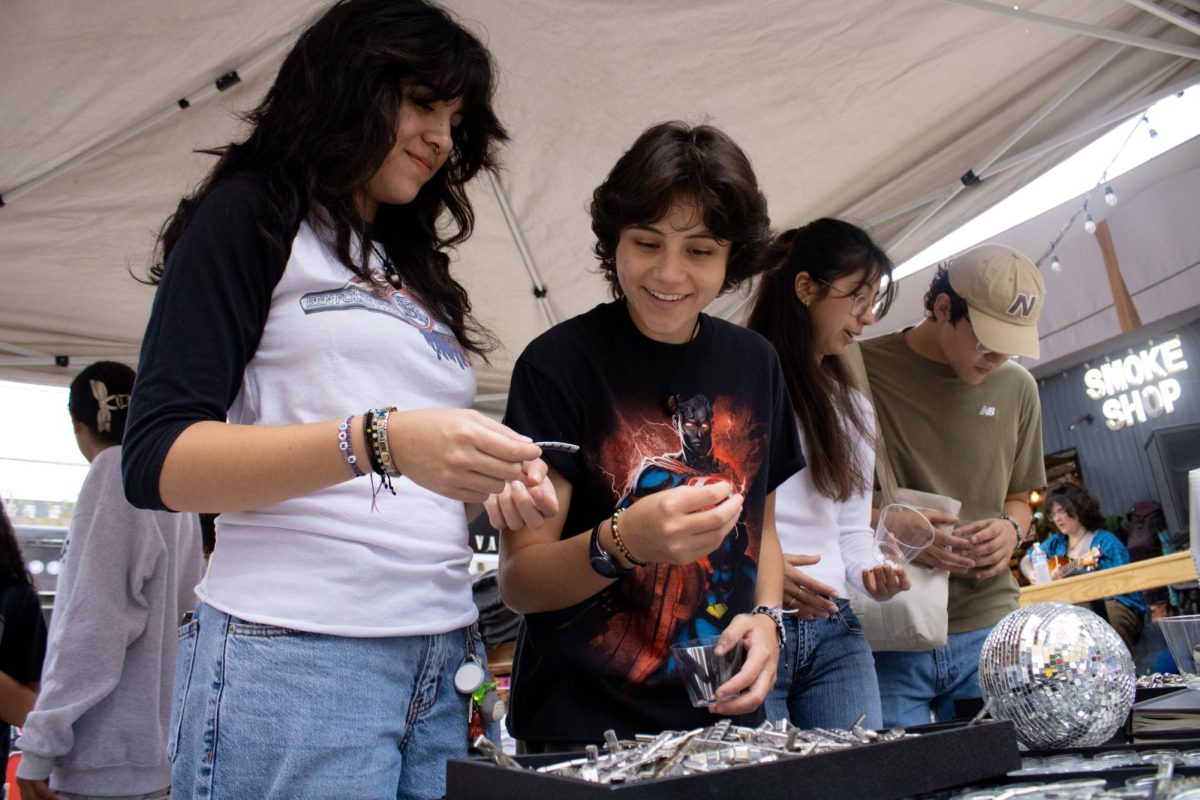 Sophmore Natalia Guzman and 20 year old Dalia Martin shop at The Glassmith Markets' West Campus Vendor Market on November 2nd. These markets occur on a weekly basis in West Campus.