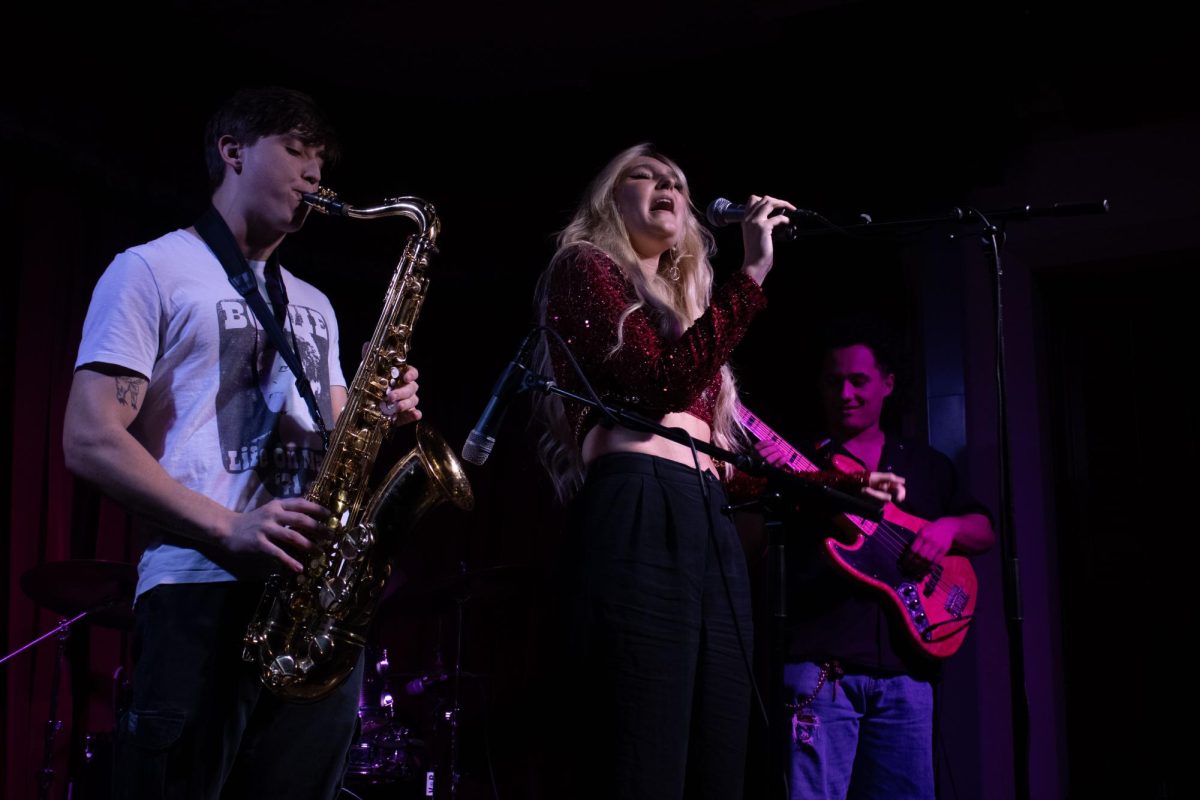 Camille Stites and her band performs at the Cozy Concert held at The Cactus Cafe on Saturday.