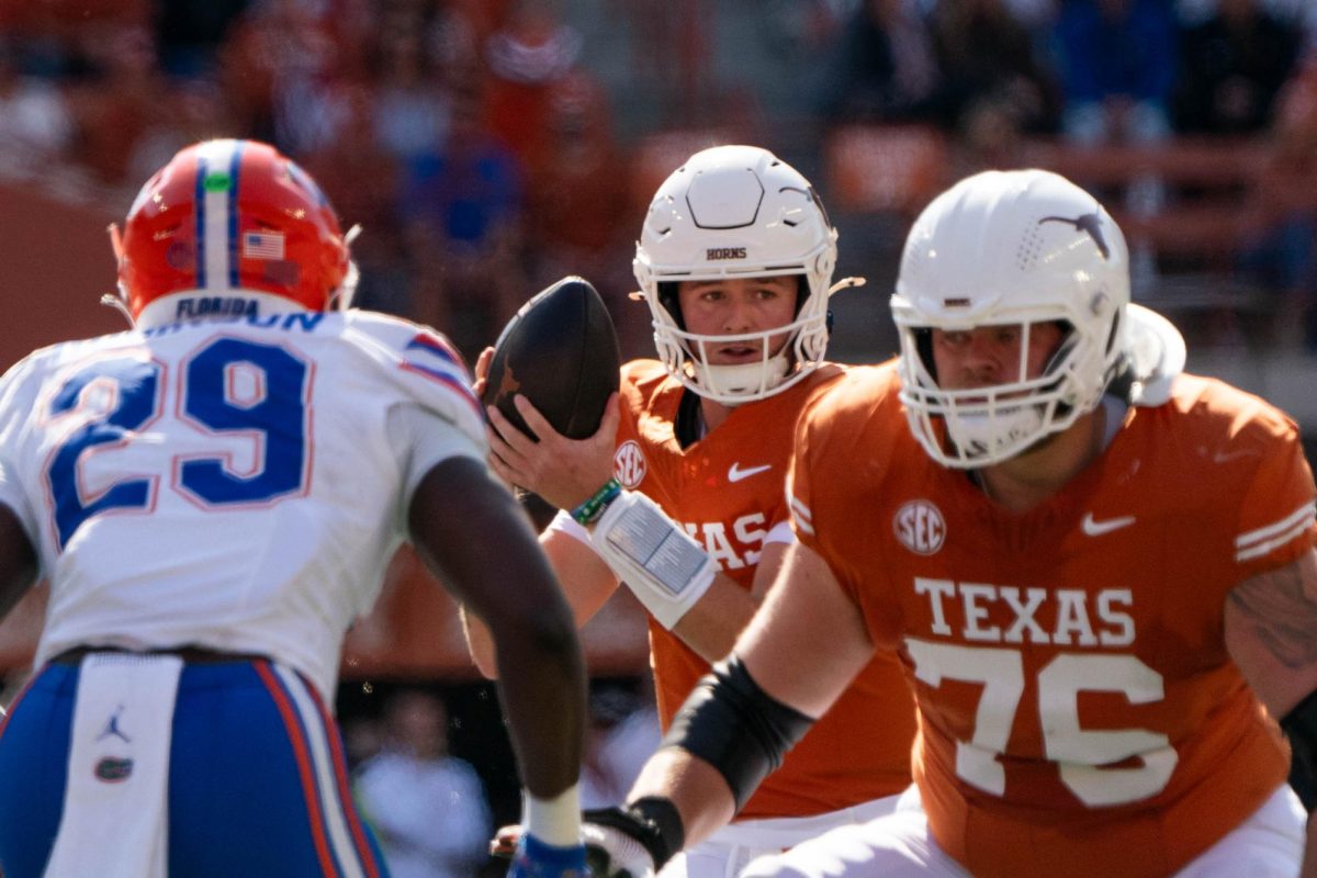 Quarterback Quinn Ewers looks for a receiver during Texas' game against Florida on Nov. 9, 2024. 