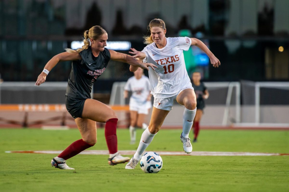 Senior midfielder Lexi Missimo dribbles the ball down the field on Sept. 19, 2024. This was the first SEC game for Texas Women’s Soccer against Alabama, a final score 2-2.