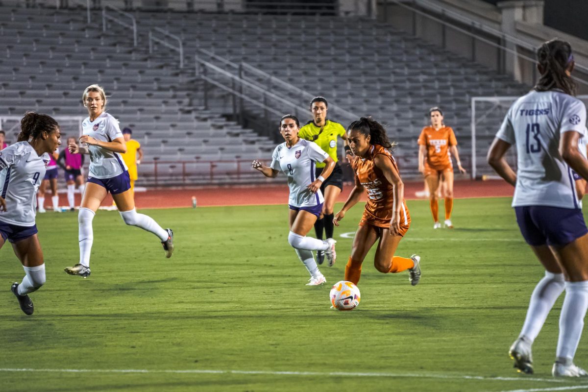 Lauren Lapomarda dribbles the ball up the field against Louisiana State University on August 24, 2023.