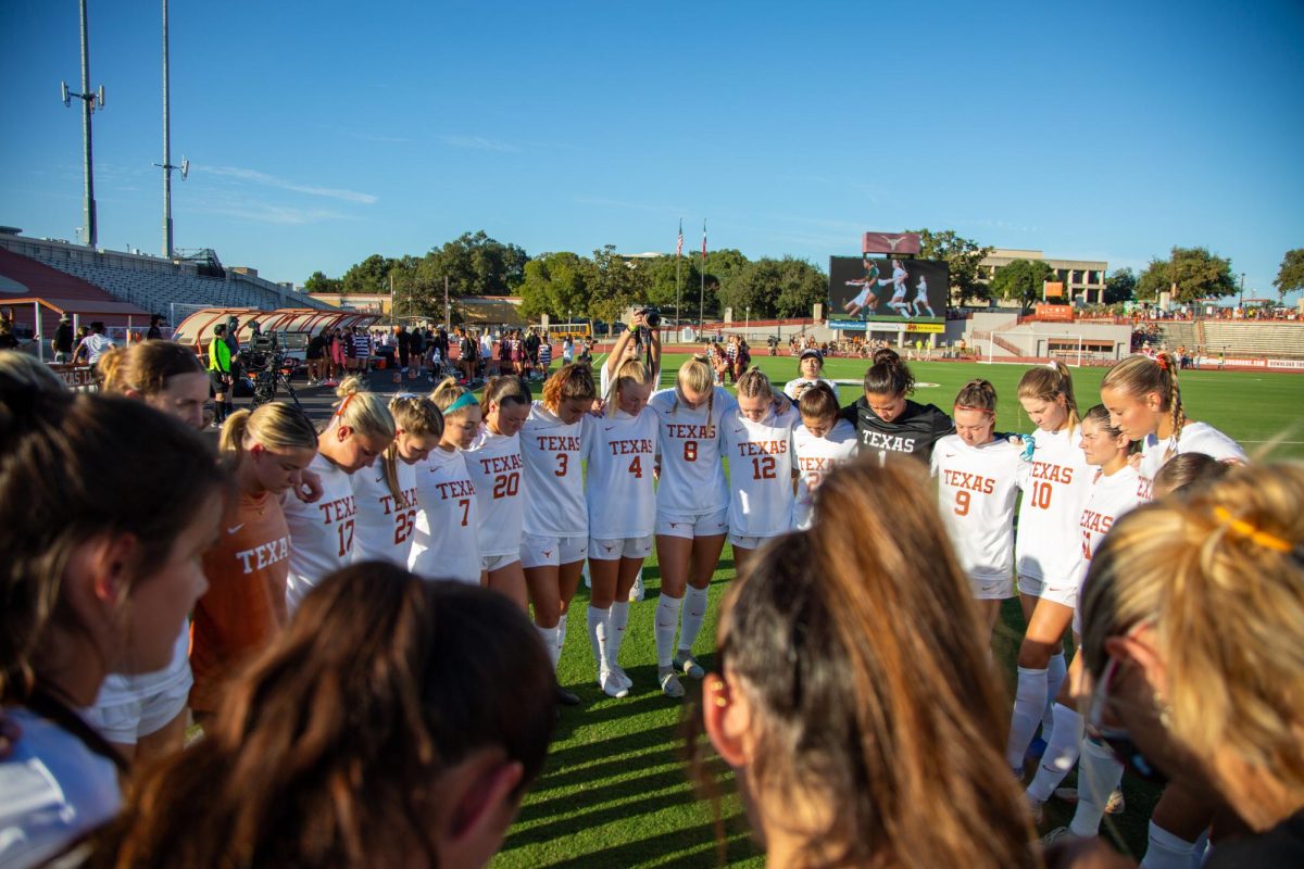 The Texas soccer team huddles ahead of their game against A&M on Sept. 29, 2024.