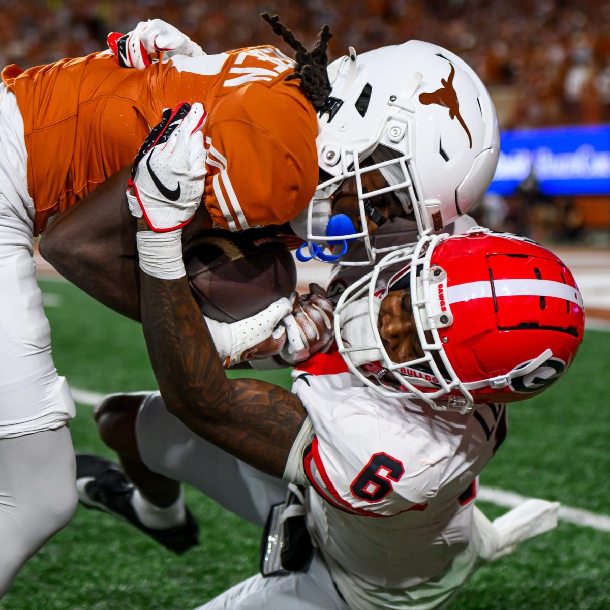 Texas Longhorns wide receiver Silas Bolden is tackled by a Georgia player on Oct. 20, 2024.