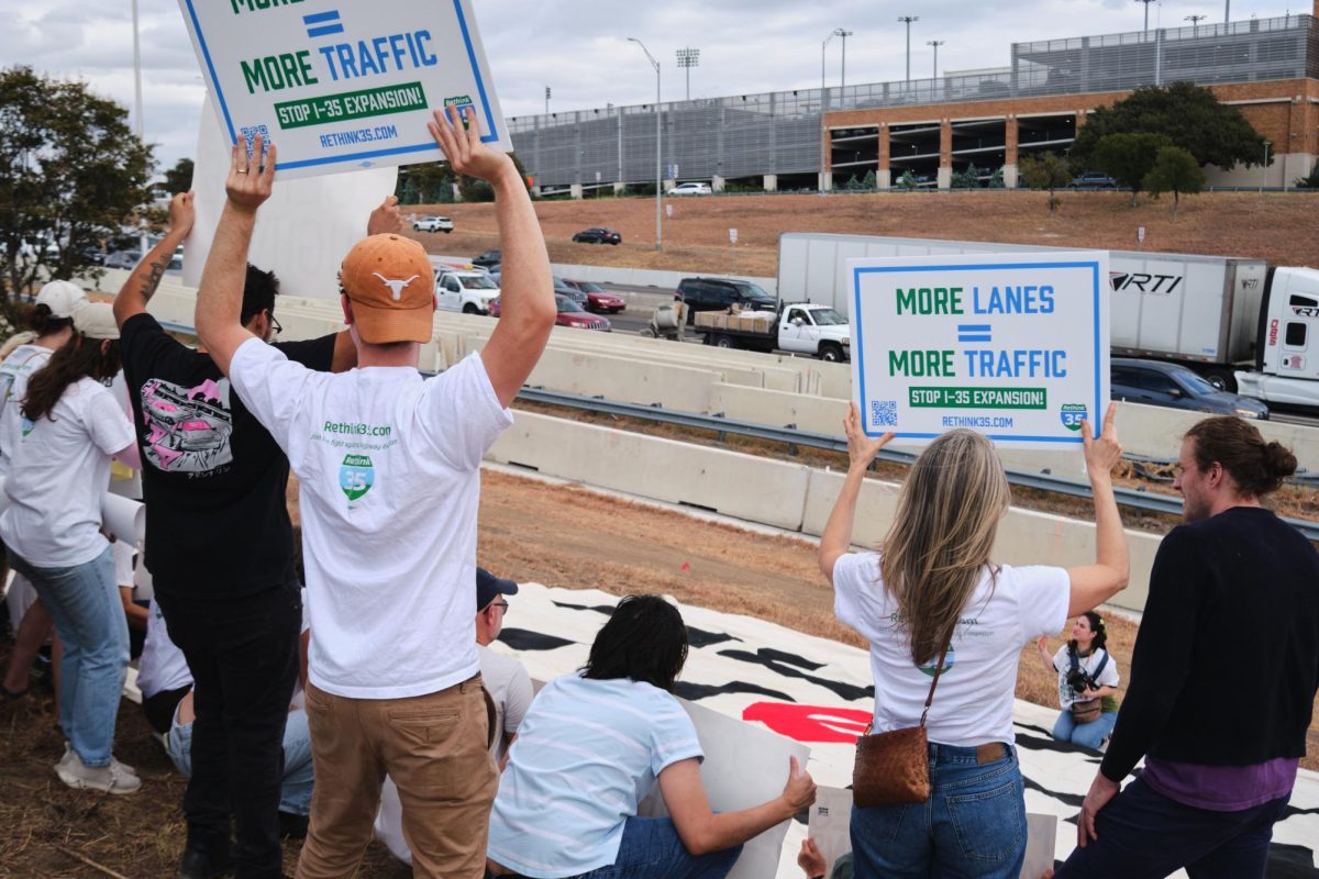 Activist organization Rethink I-35 protests the Texas Department of Transportation's I-35 Expansion Groundbreaking ceremony on Oct. 30, 2024. The ceremony launched the central section of I-35's reconstruction project. 