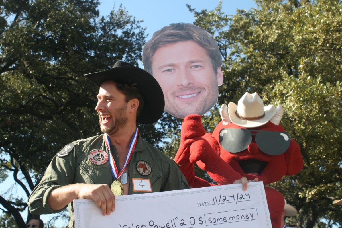 Max Braunstein wins the Glen Powell look-alike contest held at Auditorium Shores in Austin on Nov. 24, 2024.