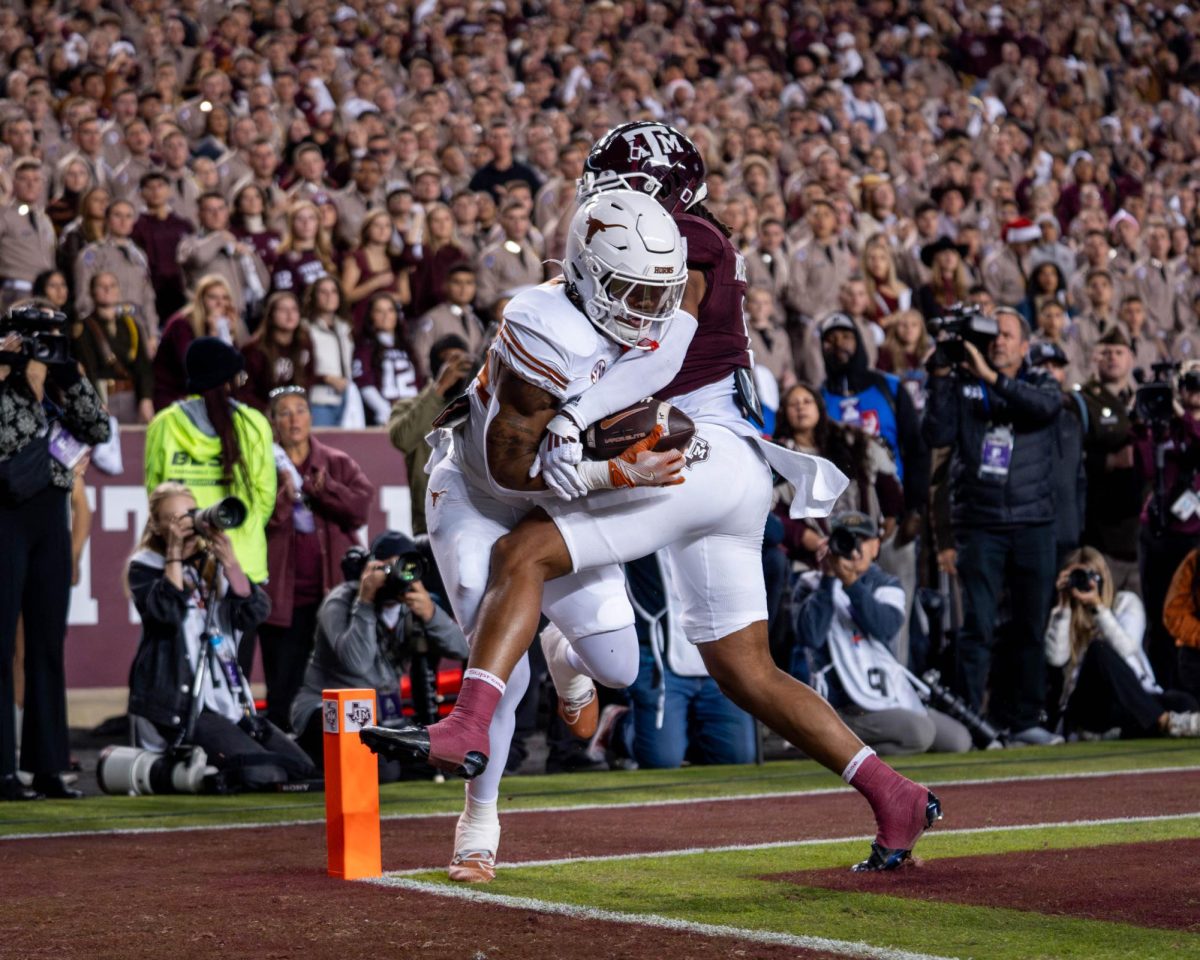 Running back Jaydon Blue catches a pass for a touchdown during the Lone Star Showdown on Nov. 30, 2024. 