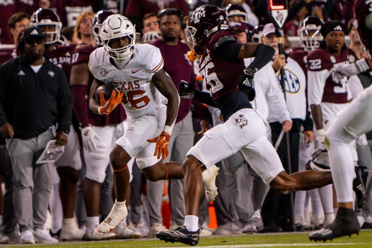 Sophomore running back Quintrevion Wisner  runs the ball during the Lone Star Showdown on Nov. 30, 2024. 