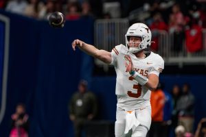 Texas quarterback Quinn Ewers passes the ball during the SEC Championship game against Georgia on Dec. 7, 2024. 