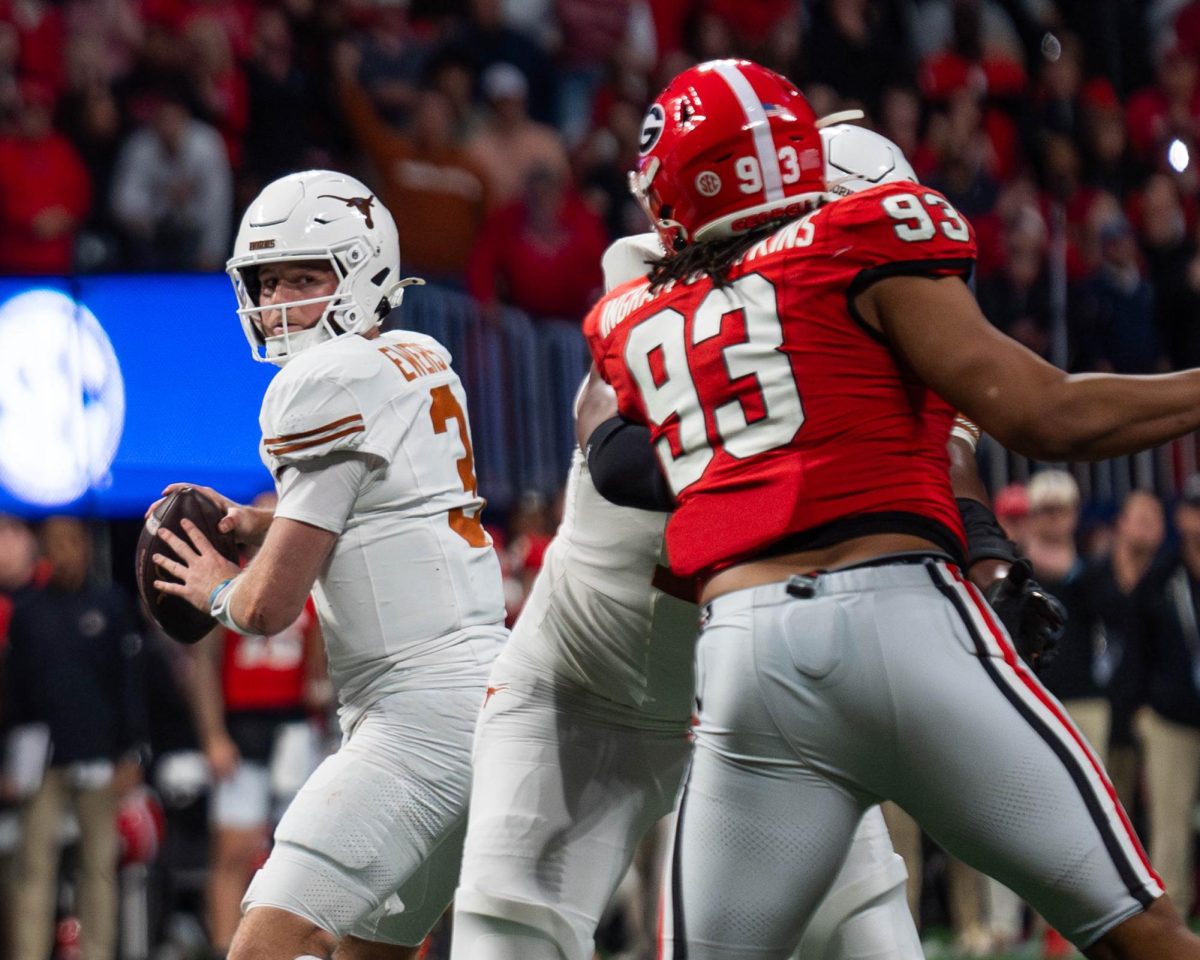 Texas quarterback Quinn Ewers looks to pass the ball during the SEC Championship game against Georgia on Dec. 7, 2024. 