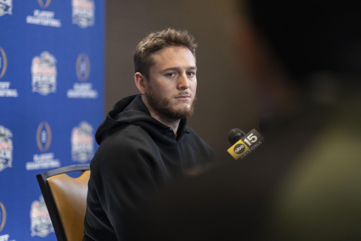 Quarterback Quinn Ewers speaks during the Peach Bowl media day in Atlanta, Georgia on Dec. 30, 2024.