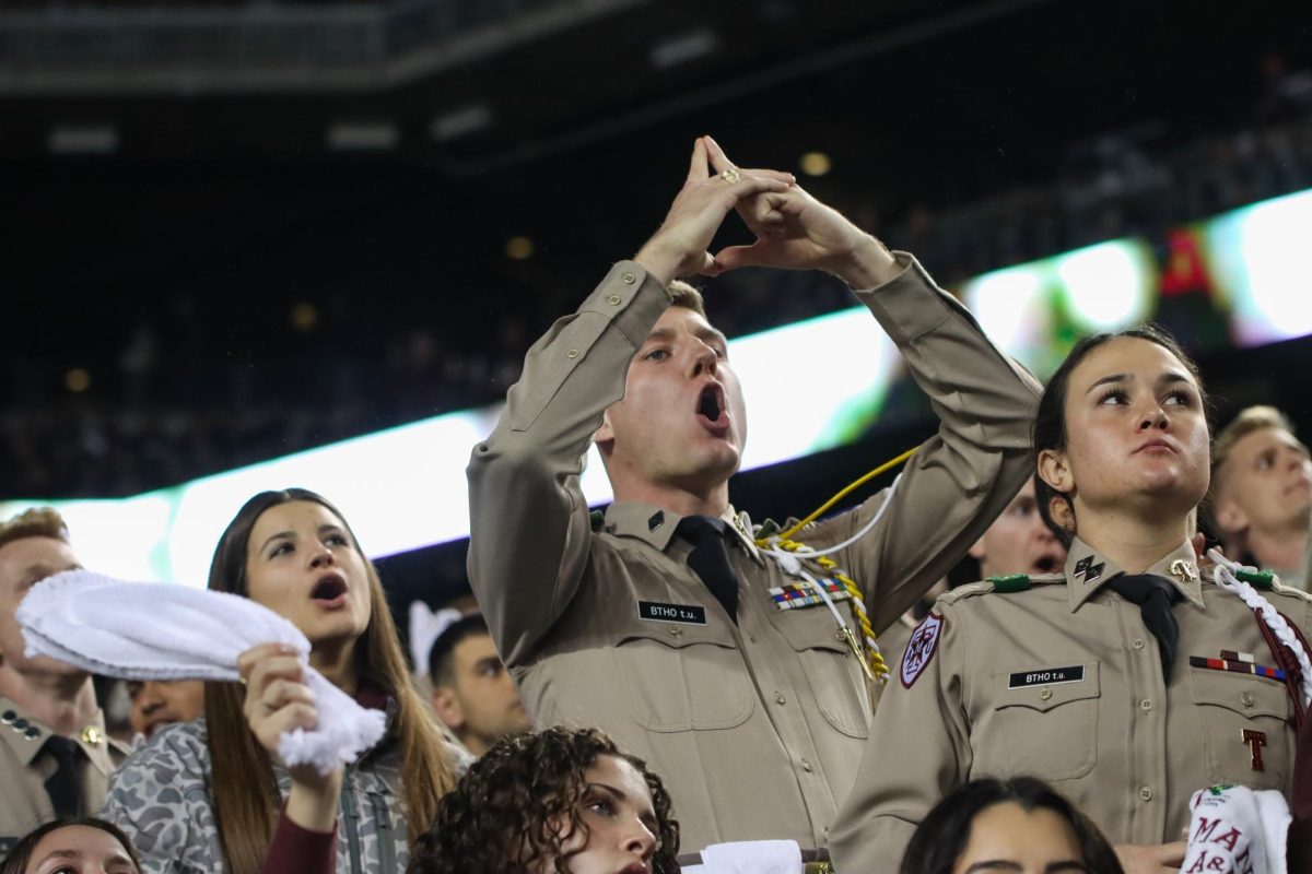 An A&M Corps of Cadets member "whoops" before the Texas vs. Texas A&M game on Nov. 30, 2024.