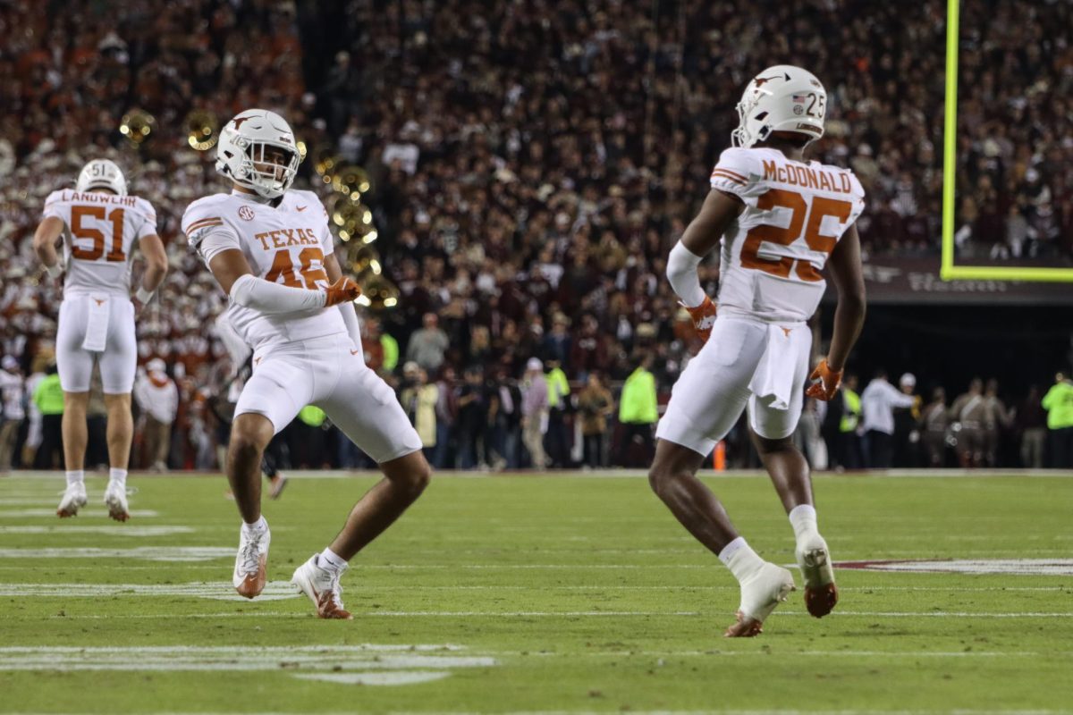 Tausili Akana and Jelani McDonald dance during the Texas vs. Texas A&M game on Nov. 30, 2024.