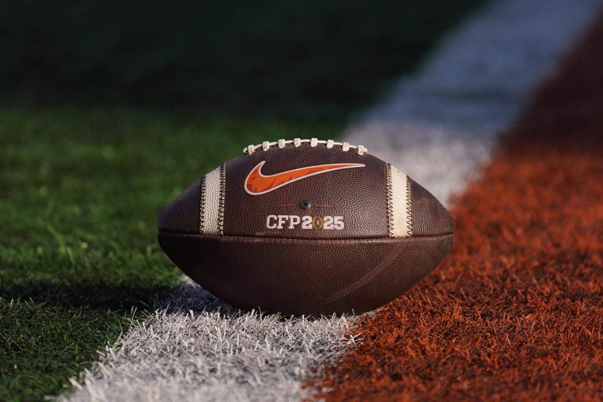 A Texas football branded with the 2025 College Football Playoff Logo.