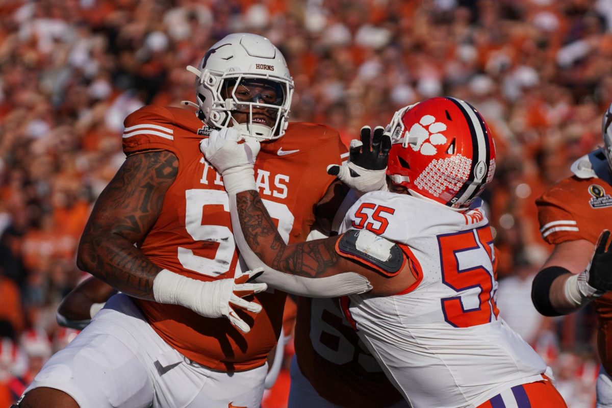 Offensive lineman DJ Campbell pushes Clemson defensive tackle Payton Page on Dec. 21, 2024.