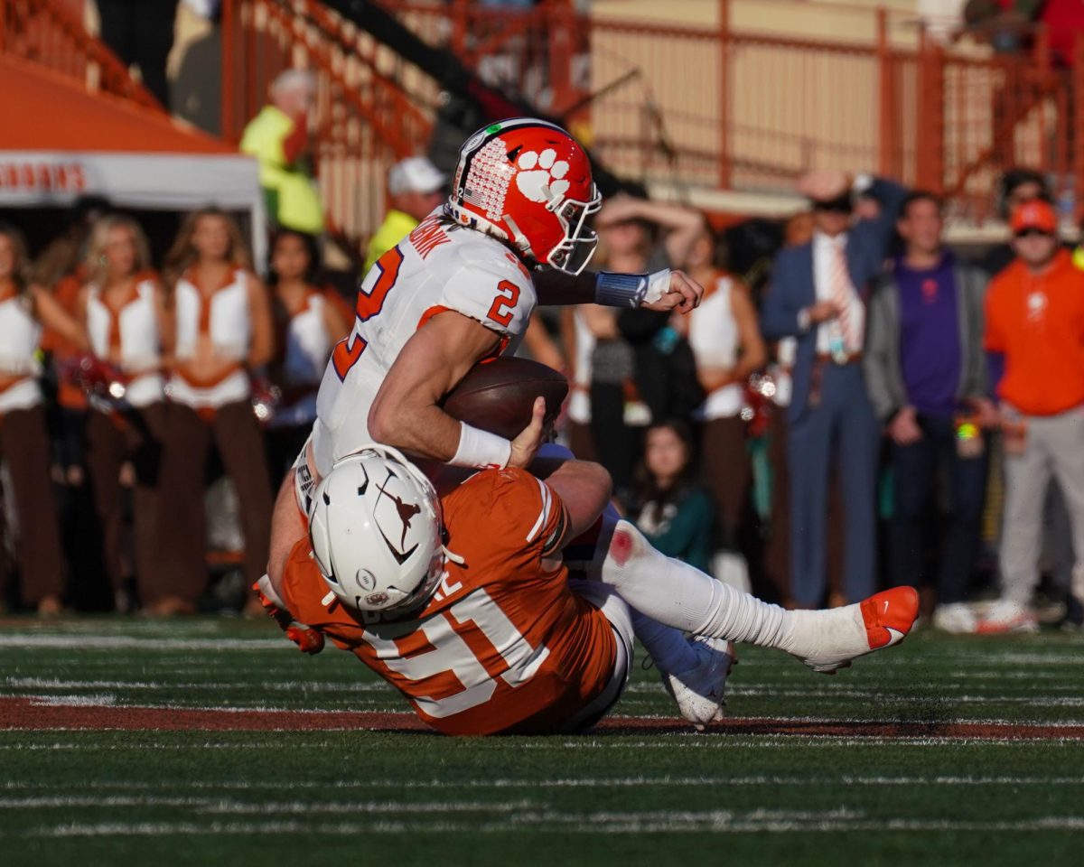 Edge Ethan Burke sacks Clemson quarterback Cade Klubnik on Dec. 21, 2024.