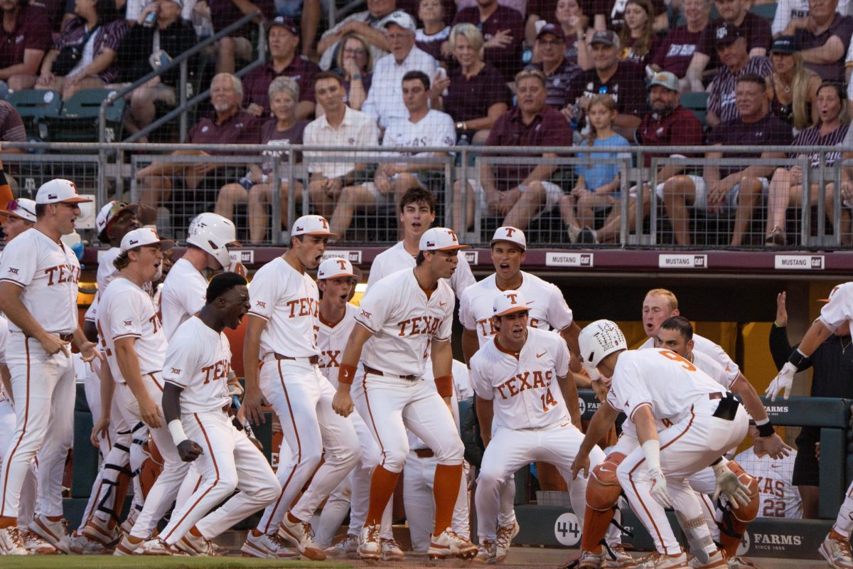 The Texas Baseball team celebrates infielder Jared Thomas' homerun off of A&M's first pitch of the evening during the regional baseball tournament game in College Station, Texas on June 1, 2024. The Longhorns lost the game 4-2 after 11 innings. 