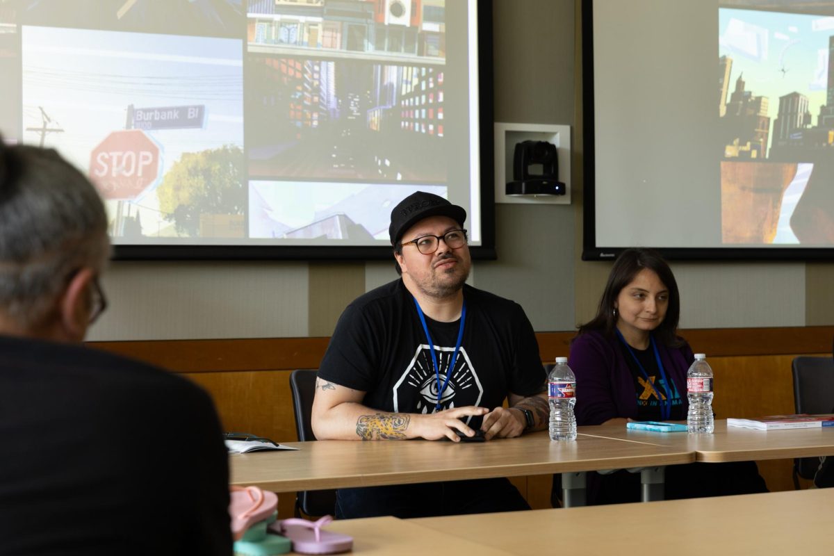 Illustrator Pablo Leon speaks during the Industry/Publishing panel at the BIPOC PoP Symposium on March 8. He spoke on his own experiences and the future of illustration. 