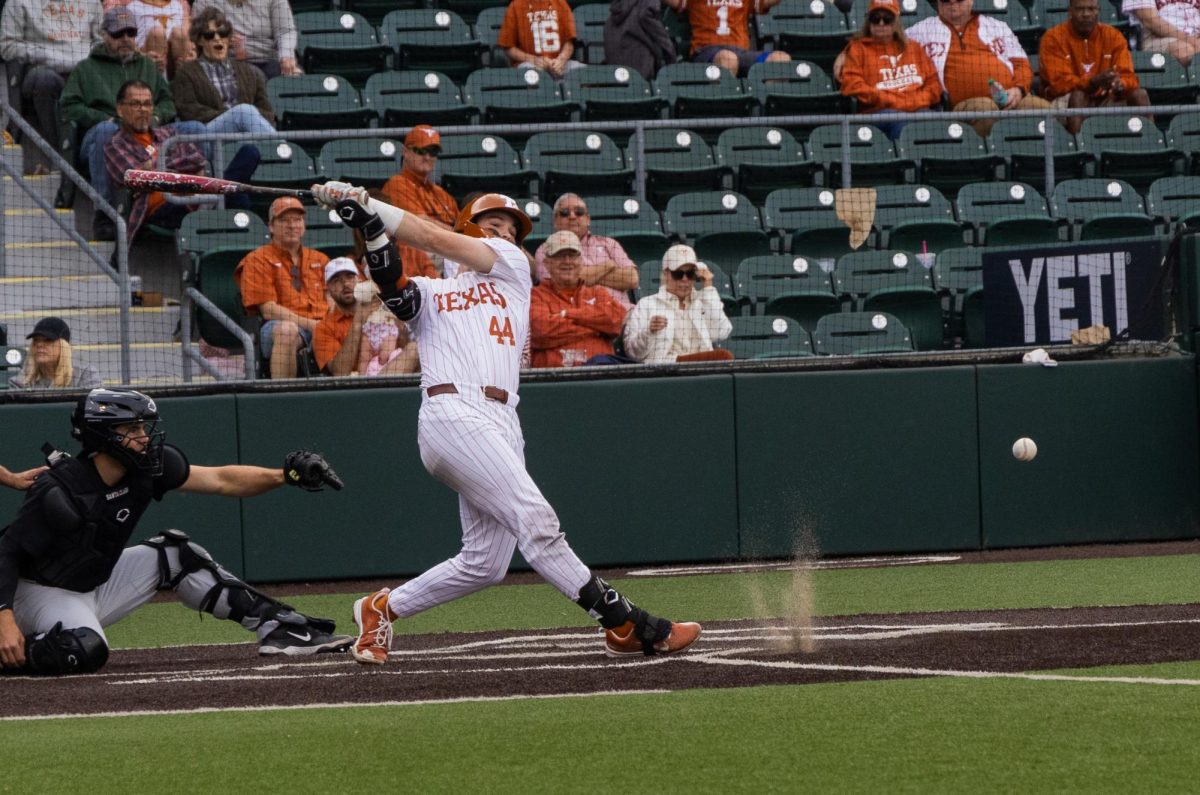 Max Belyeu hits a pitch during Texas' game against Santa Clara at UFCU Disch-Falk Field, March 8, 2025. 