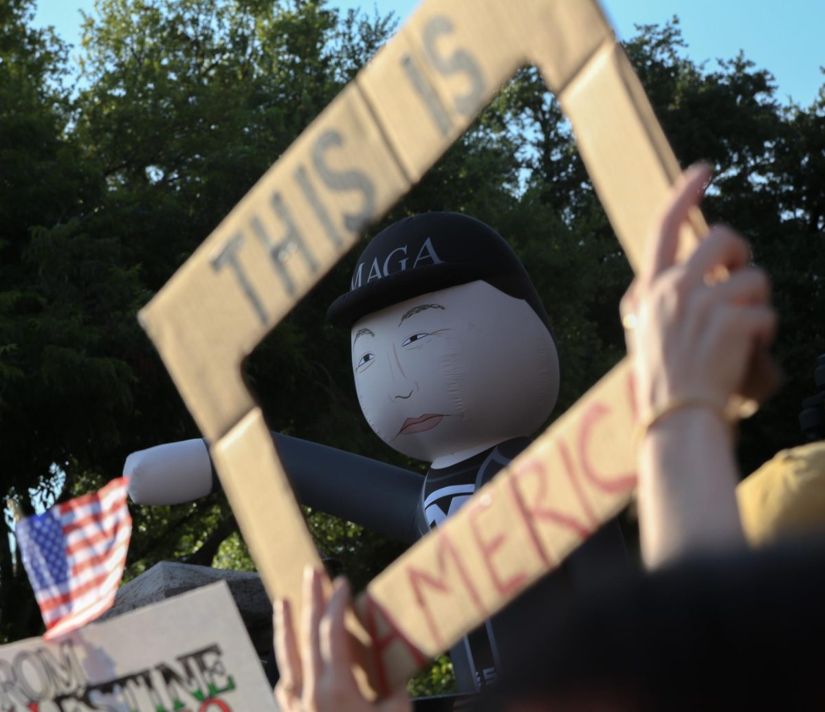 Protesters bring an inflatable Elon Musk to the No Kings protest at the Texas Capitol on June 14, 2025.
