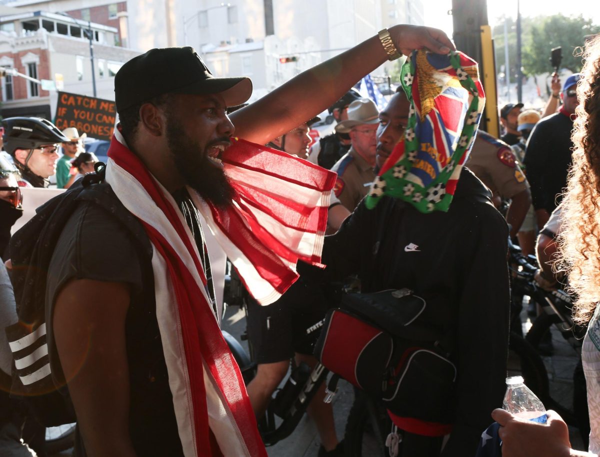 A Pro-MAGA Twitch streamer yells at protesters at the No Kings protest in Austin, Texas before he was arrested on June 14, 2025. 