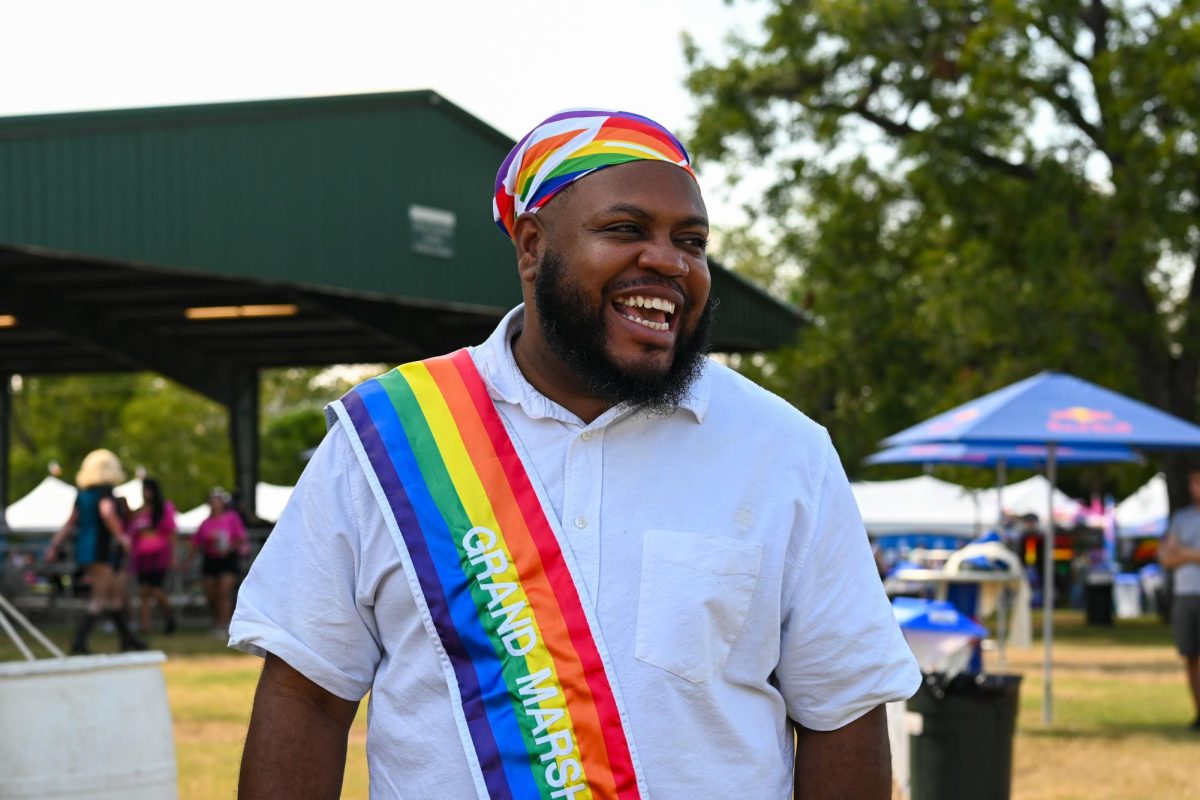 Joe Anderson Jr., one of the three 2025 Austin Pride Grand Marshals, stands for a portrait on Aug. 23, 2025. 
