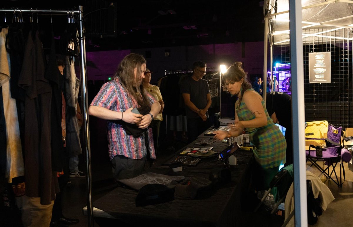 Person buys merch on day two of the Levitation music festival on Sept. 27, 2025.