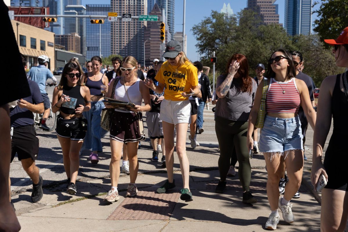 Este Haim talks to a fan on Sept. 26, 2025. The three sisters moved throughout the crowd, met fans and signed items. 