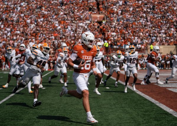 Sophomore Arch Manning strides into the end zone for the Longhorns opening score against UTEP on Sept. 13, 2025. 
