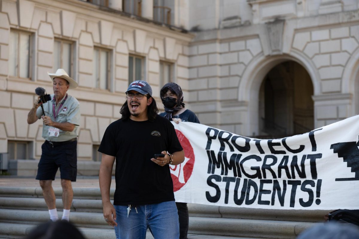 A member of the Austin Students for a Democratic Society organization gives a speech on fighting Trump’s agenda on Sept. 4, 2025. Dozens of protesters gathered at the main mall to support their cause. 