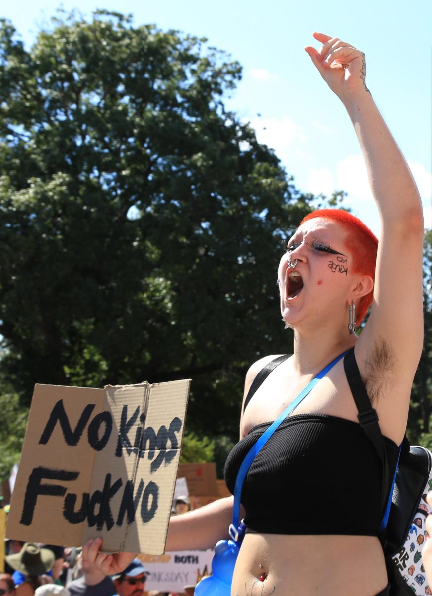 A protester yells during the No Kings protest at the Texas Capitol on Oct. 18.