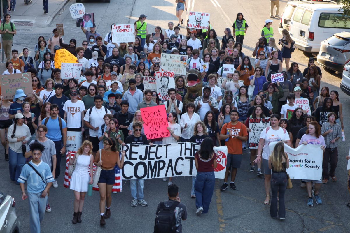 Protestors march down 21st street at the SDS organized protest on Monday, Oct. 20.