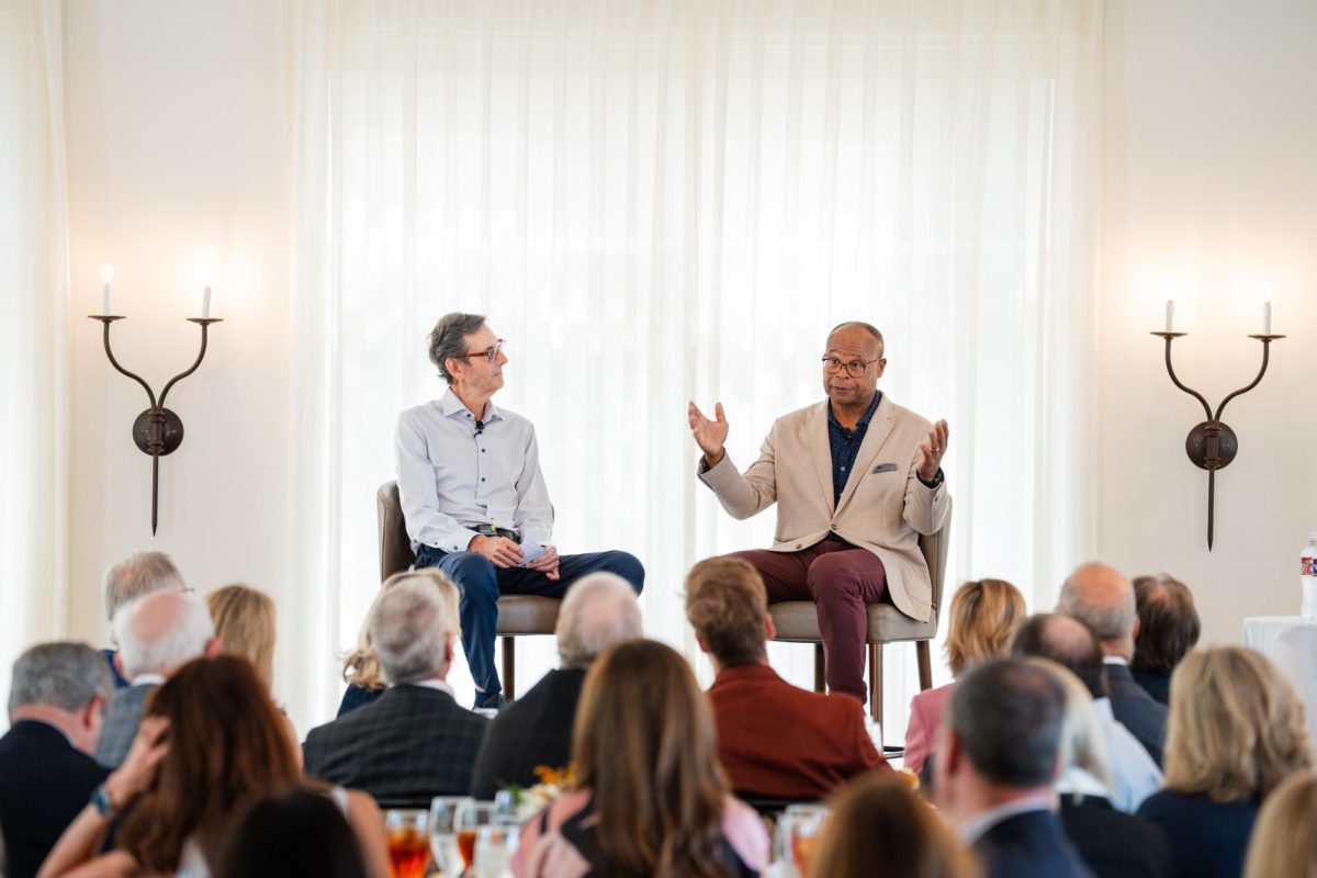 From left, Dr. Hunt Batjer, M.D. and former NFL linebacker Mike Singletary discuss dementia prevention on Tuesday, Oct. 28. This is the second event in a three-part Leading the Conversation Speaker series.