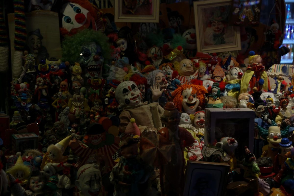 Clown memorabilia is seen through the window of Aaron's Rock & Roll on Oct. 31.