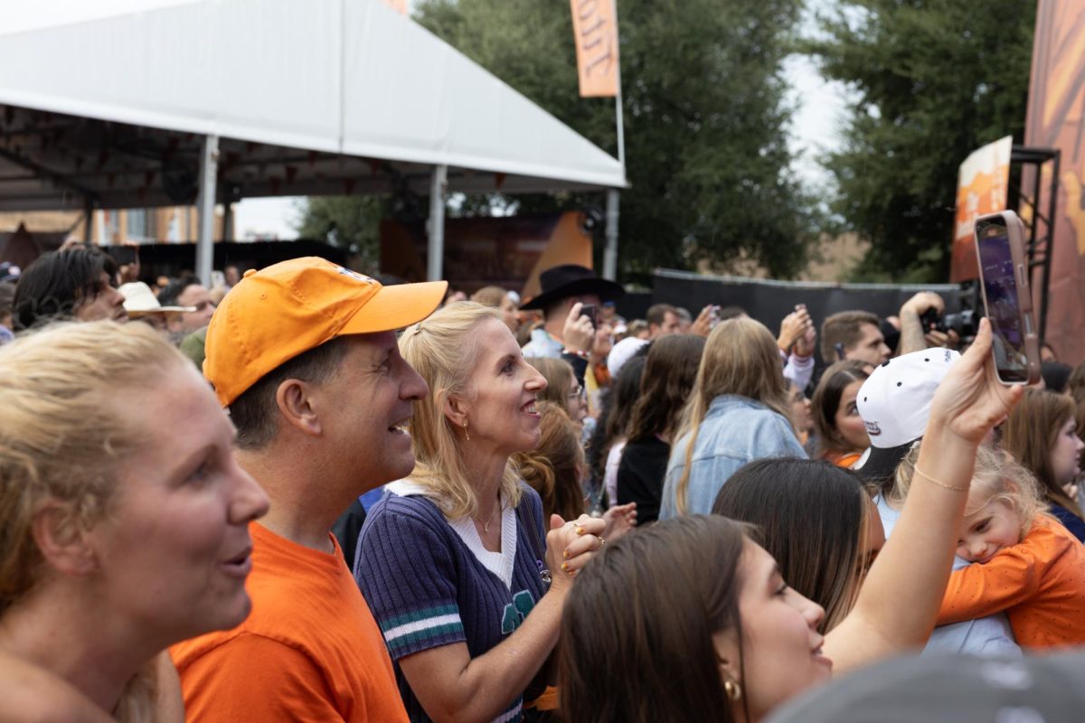 Fans of The Beach Boys cheer as they perform at the LBJ Lawn on Nov. 1.