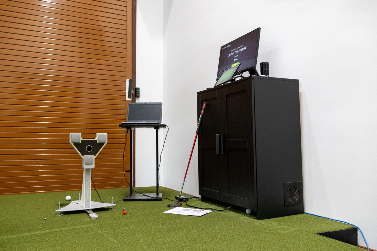 Putt track simuator equipment inside UT Golf Academy on Nov. 11.