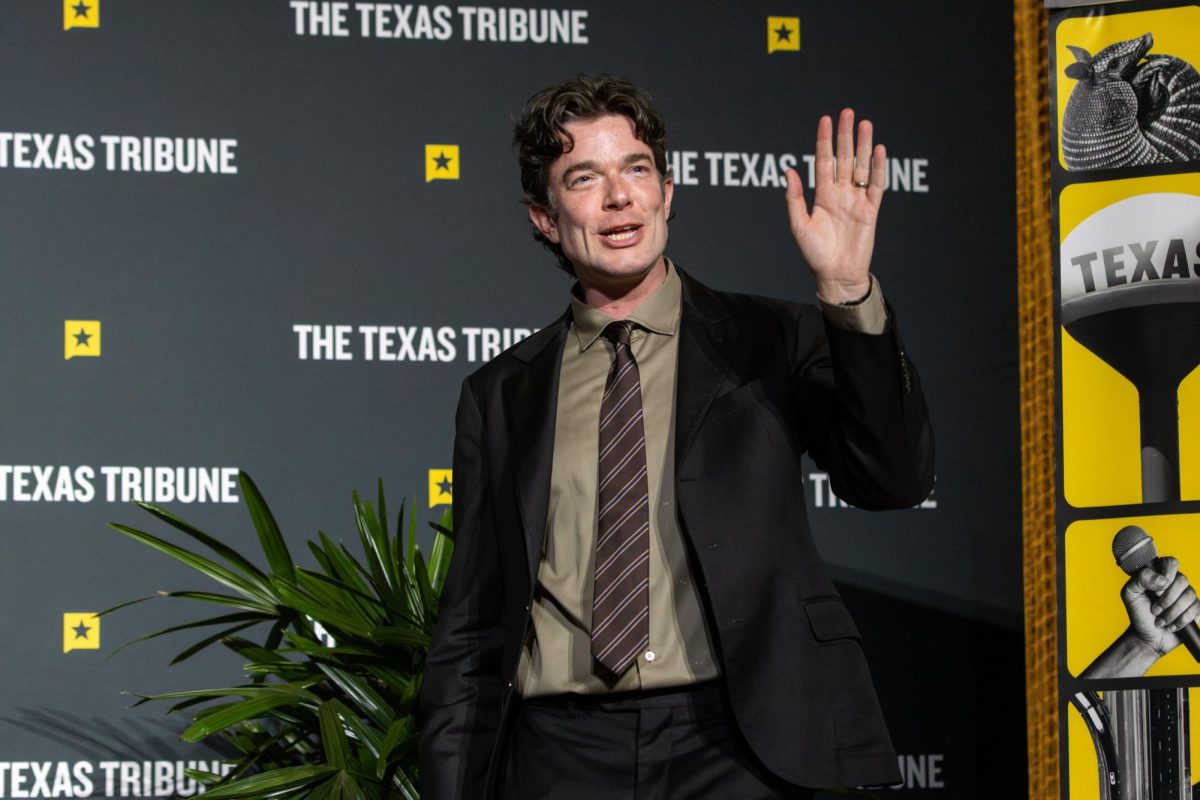 Comedian John Mulaney waves to the audience at Texas Tribune Festival ahead of his conversation with writer and director Noah Hawley at Texas Tribune Festival on Friday, Nov. 14. 