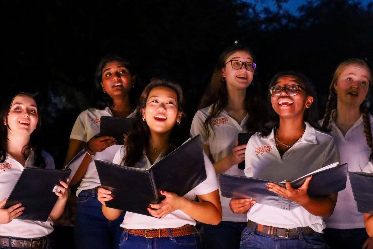 The Longhorn Singers perform a holiday melody mashup of popular Christmas songs at the Longhorn Lights festival on Nov. 18, 2025.