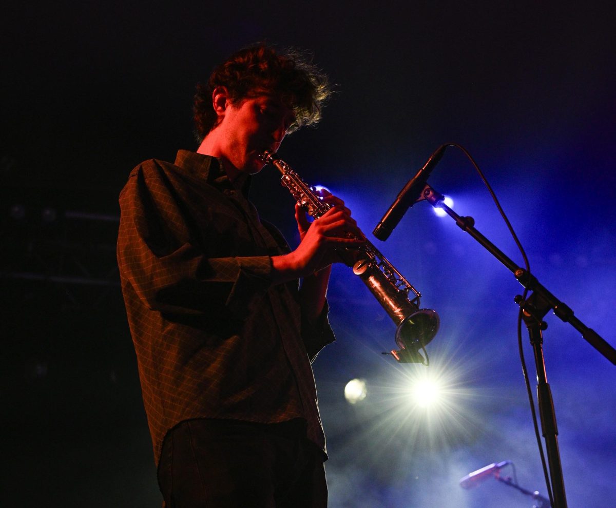 Saxophonist Fred Donlon-Mansbridge supports Dove Ellis during their opening set at Stubb's Waller Creek Amphitheater on Nov. 5.