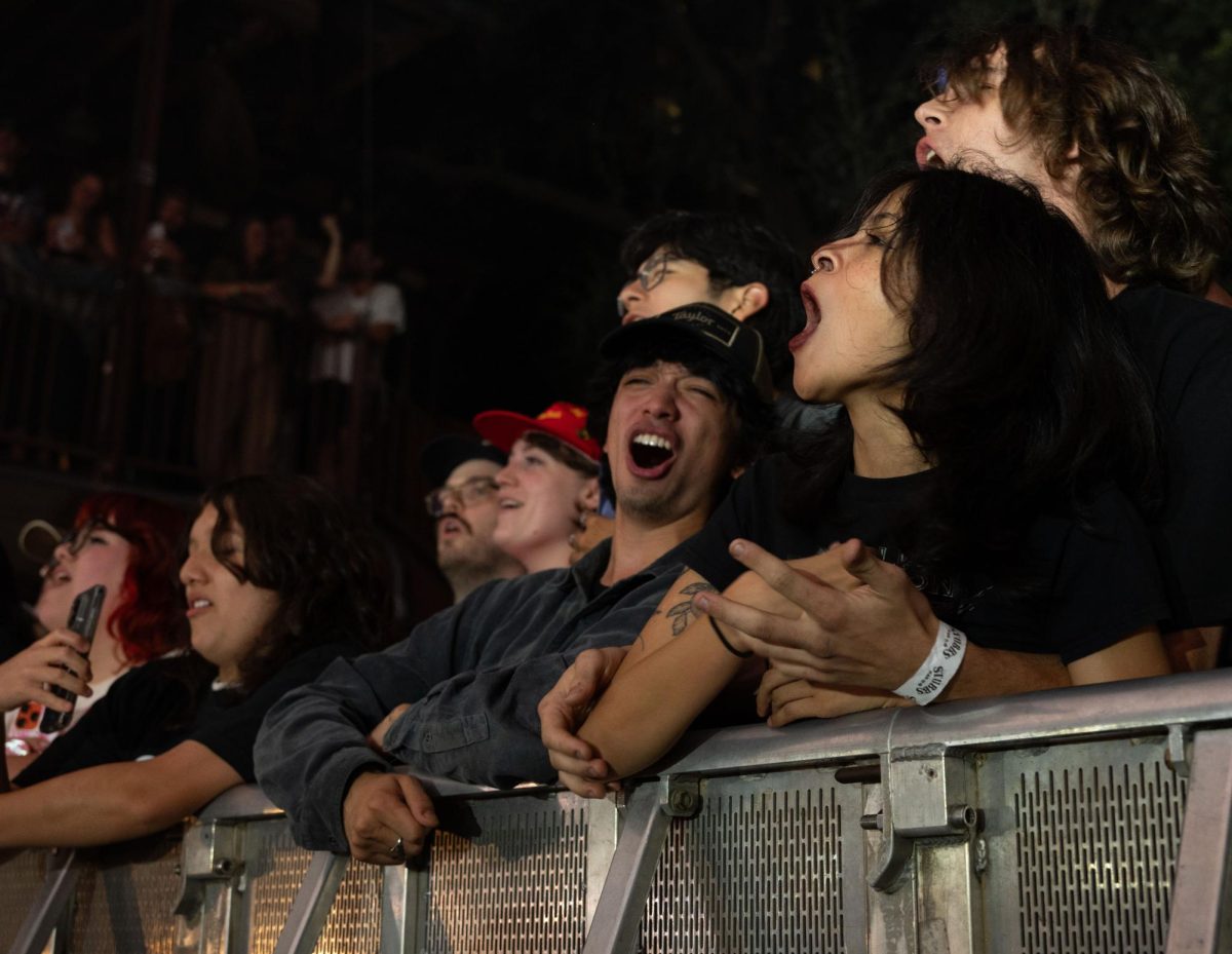 Audience members sing along to Geese's set at Stubb's Waller Creek Amphitheater on Nov. 5.