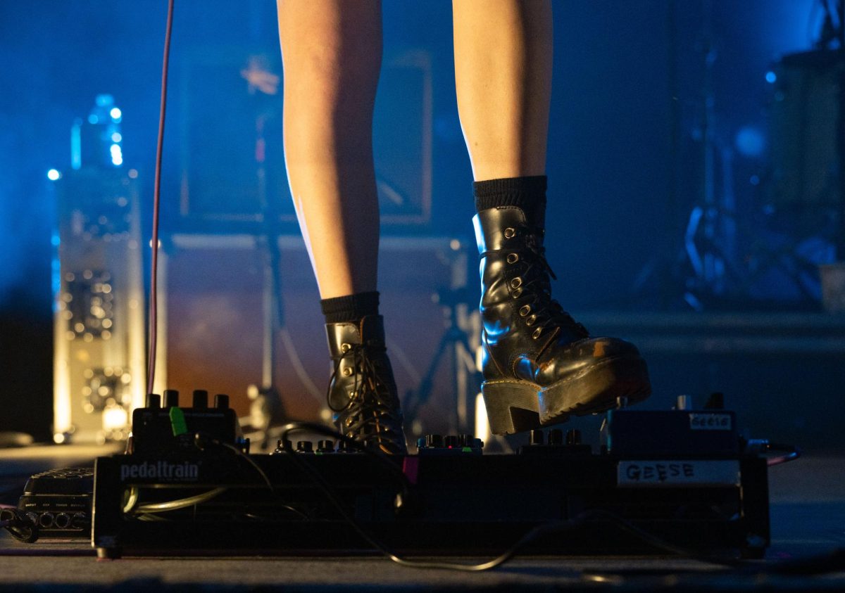 Emily Green uses a pedalboard during Geese's set at Stubb's Waller Creek Amphitheater on Nov. 5.