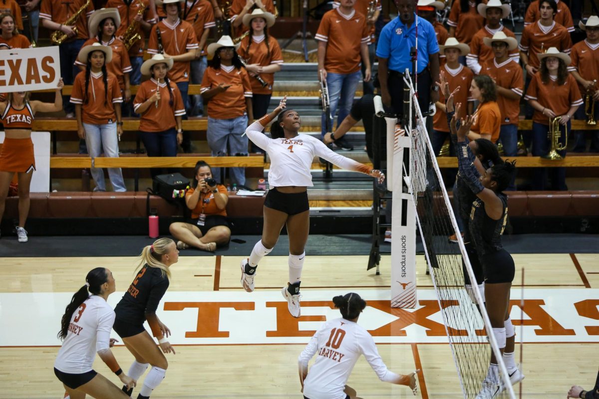 Junior outside hitter Torrey Stafford lines up a hit during the game against Vanderbilt at Gregory Gym on Sept. 24, 2025.