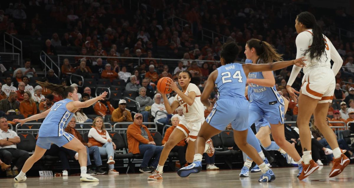 Texas guard Jordan Lee looks for an opening during Texas' game against North Carolina Thursday, Dec. 4 at the Moody Center.