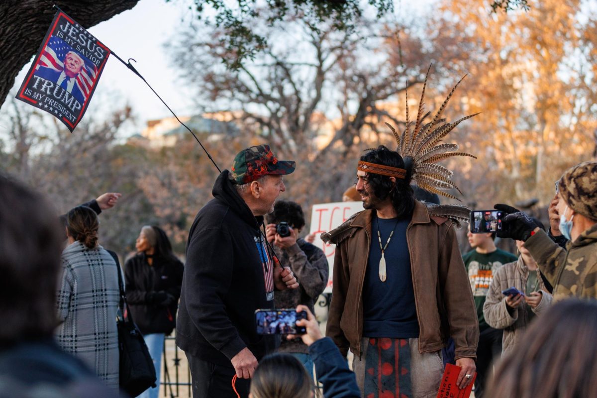 Protestors argue with an counter-demonstrator on Friday, Jan. 30.