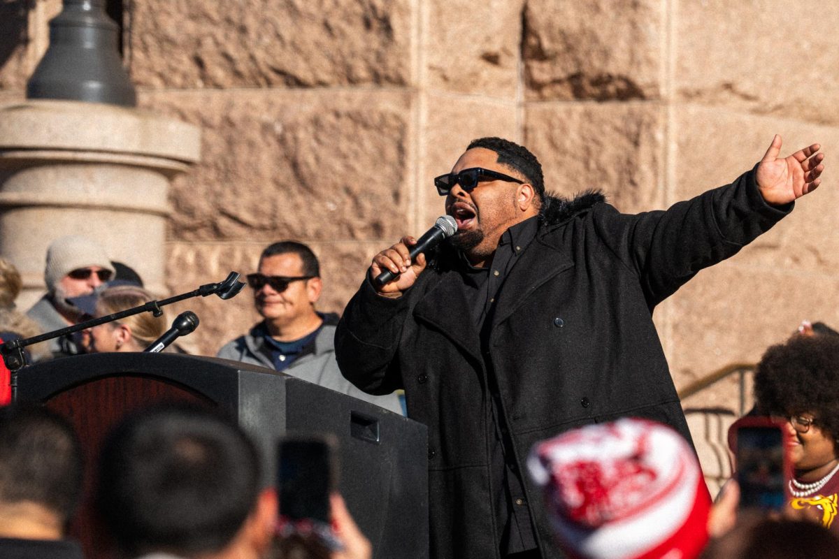 A singer performs at the Capitol of Texas steps for the Dr. Martin Luther King Jr. parade and festival on January 19, 2026.