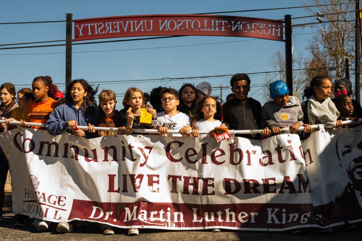 Marchers in the Dr. Martin Luther King Jr. parade arrive at the festival's Huston-Tillotson University celebration site on January 19, 2026.