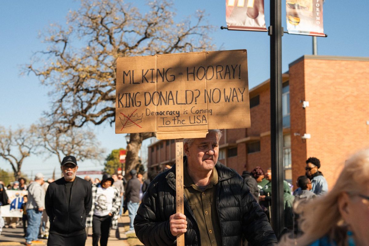 A man enters the Dr. Martin Luther King Jr. festival following the march on January 19, 2026.