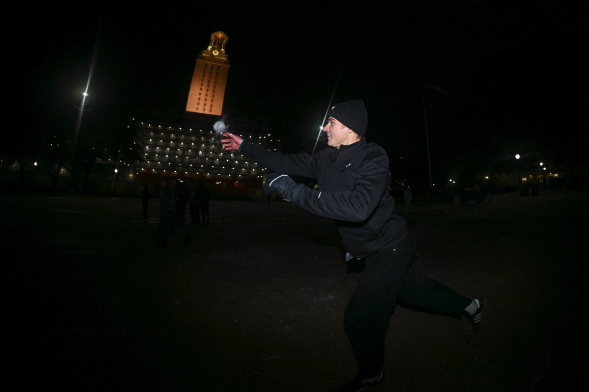 Garik Livingston throwing a snowball in front of the tower on Jan. 26.