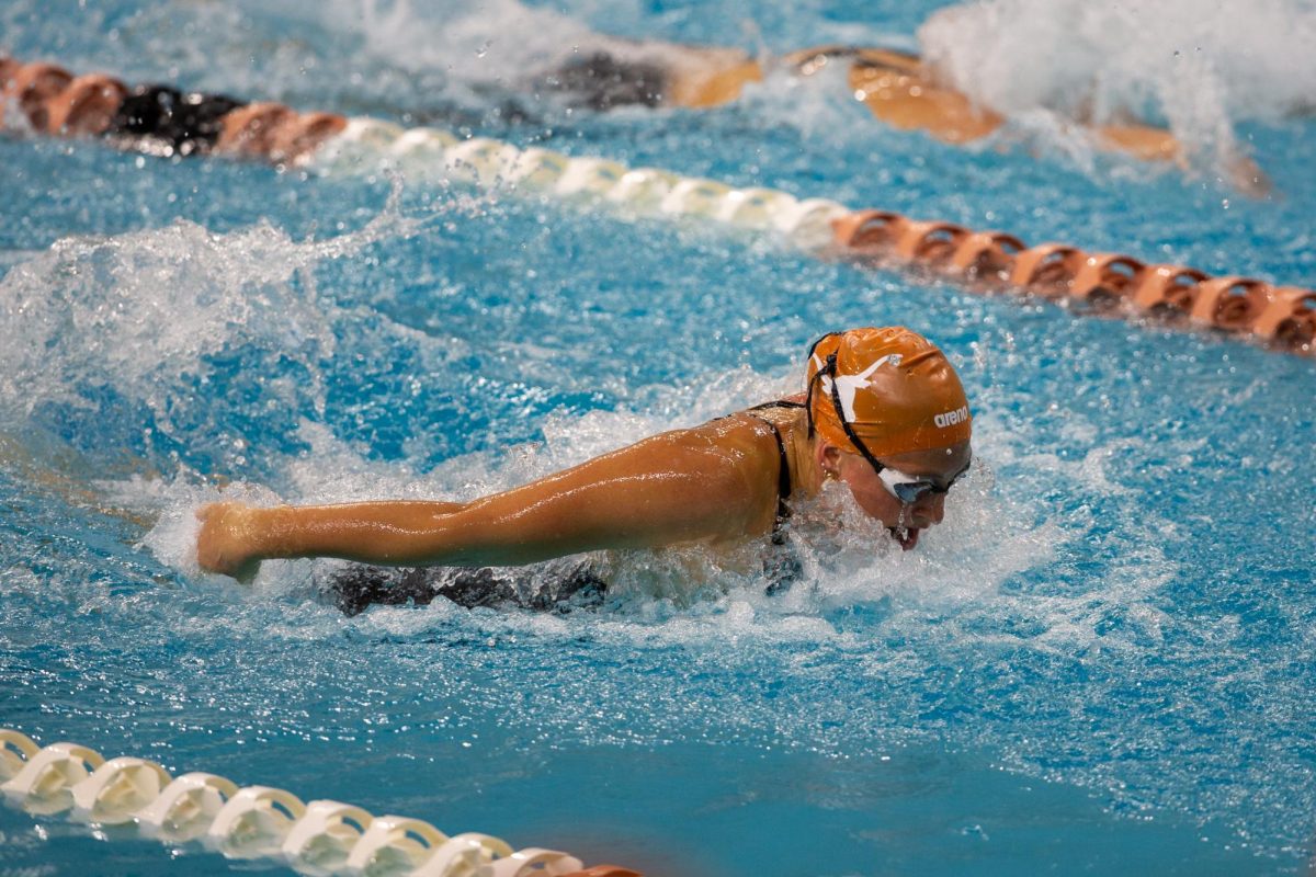 A University of Texas women's swimmer during the "Dust Off Your Boots Invitational" in Austin, Texas, on Sept. 26, 2025.