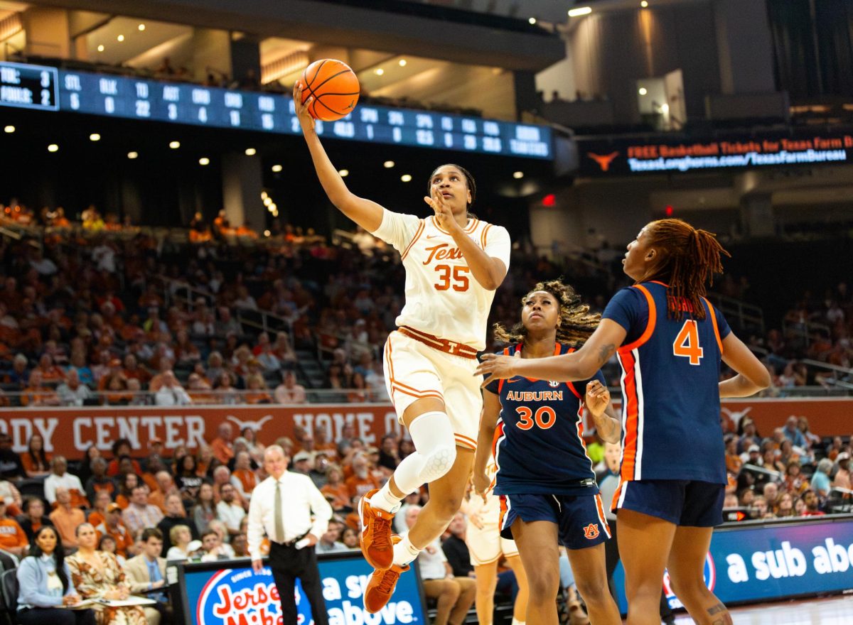 Junior Madison Booker setting up a lay up during a game against Auburn on Thursday, Jan. 8.